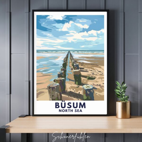Schönerfühlen Poster von Büsum im schwarzen Rahmen auf Tisch stehend